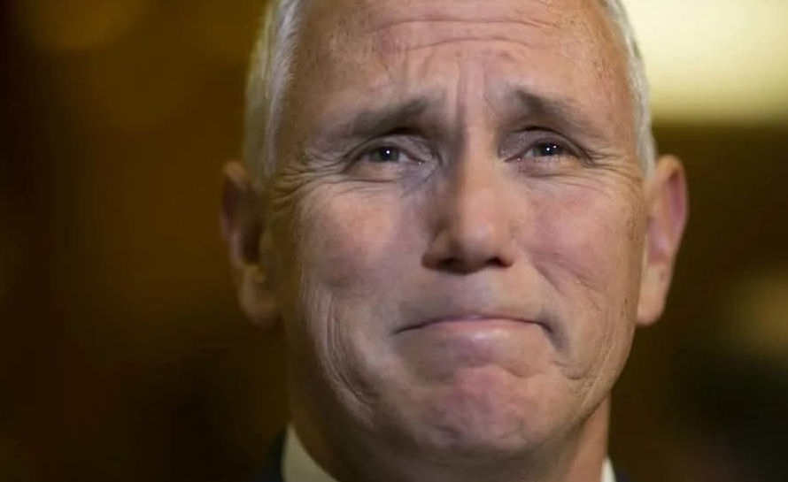 Mike Pence delivering an emotional announcement at a podium