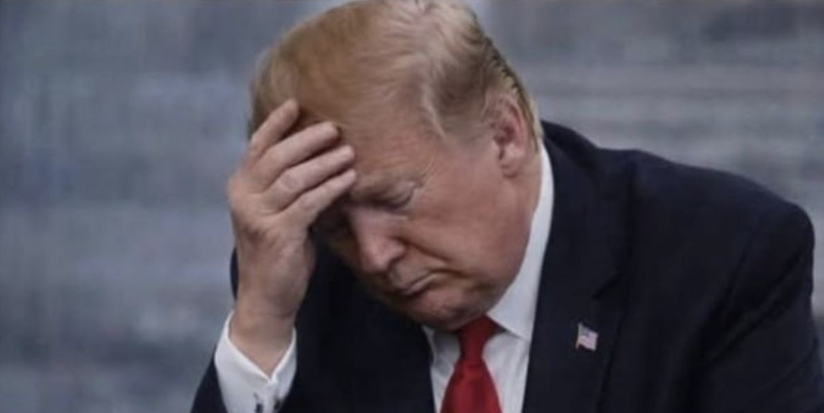 Donald Trump standing quietly in Washington D.C. during reflective moment after presidency